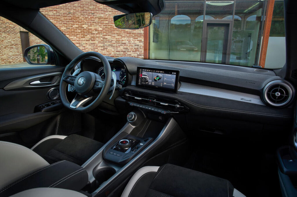 A modern car with a sleek design, showcasing its wheels and interior features, emphasizing its role in transportation.