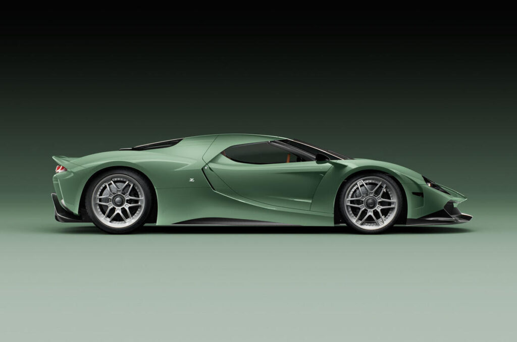 A sleek sports car with shiny alloy wheels parked on the street.